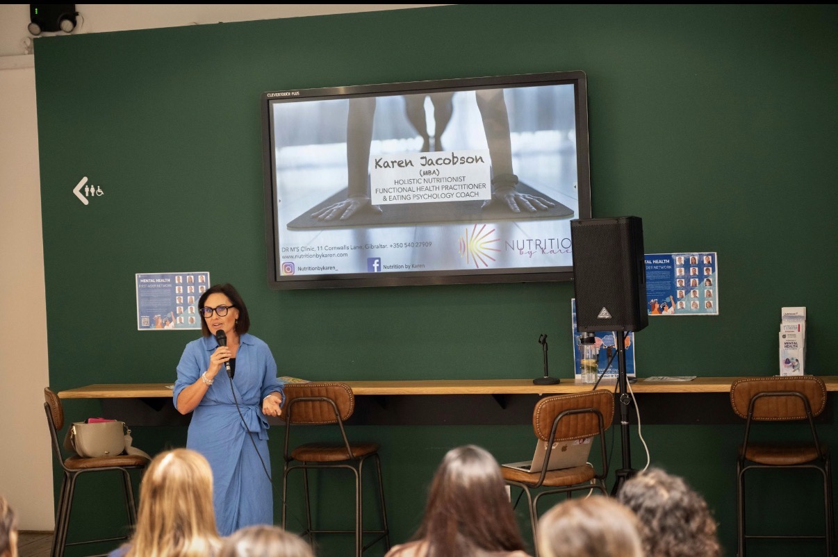 Karen giving a corporate nutrition talk to an audience